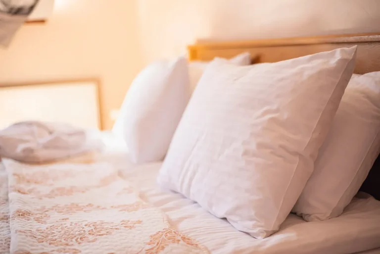 pillows on the bed in the hotel room, cozy atmosphere rest